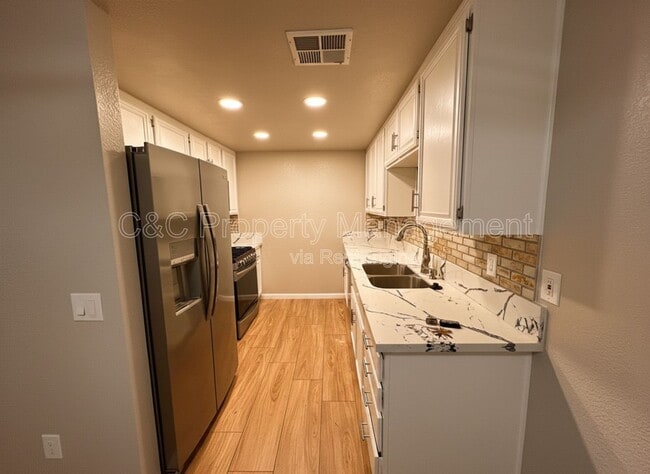 Photo - 1380 W 48th St Unit 116