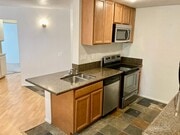Photo - One Bedroom with Garage and IN-Unit laundry in Resort-Style Complex