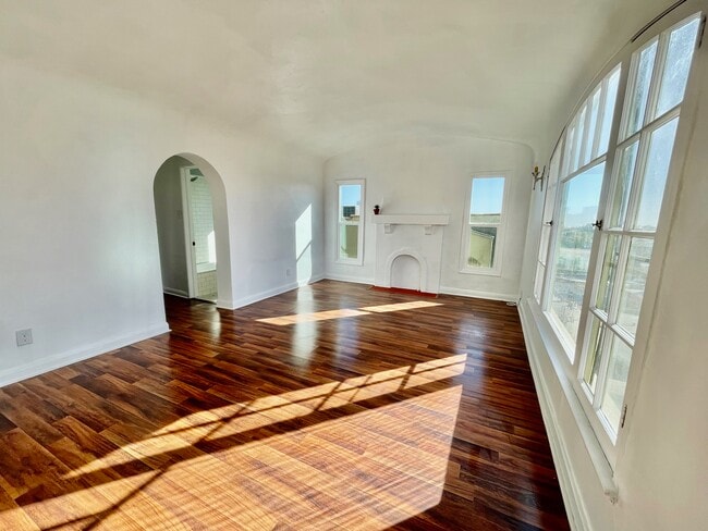 Faux Fireplace with views of DTLA skyline through window - 1306 Montana St Unit 1306.5