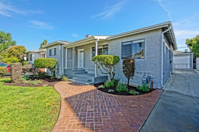 Photo - REMODELED, BRIGHT & AIRY 3BR2BA HOME W/ DETACHED GARAGE, CHARMING FRONT PORCH/YARD & HUGE REAR YA...