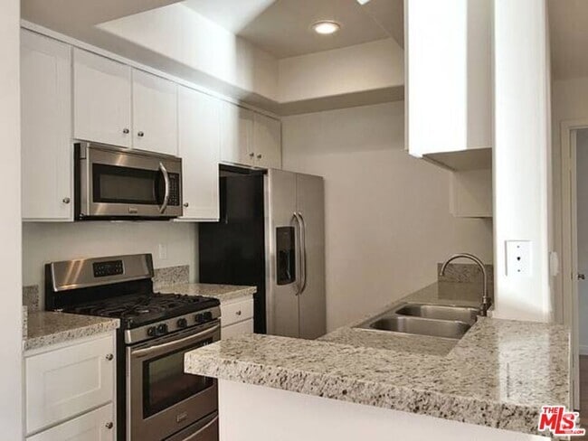 Building Photo - 14430 Benefit St Unit 108 Rental