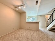 Photo - Spacious & Move In Ready 2BD Townhome! New Carpet! Full Size in Unit Washer/Dryer! Attached Garage!