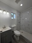 Photo - 635 W 51st St Apartment Unit three quarters
