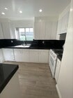 Kitchen With Lots Of Cupboards - Large Remodeled 2x2 Unit with Huge Patio