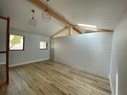 Large bedroom with space for an office - tempered glass above wall provides noise insulation. - 3605 Helms Ave