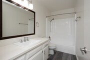 2BR, 1BA - 700SF - Bathroom - Sunset Bay III Apartment Community
