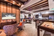 Our amenity spaces offer plenty of space to work, play, and relax. - Valentia by Windsor Apartments
