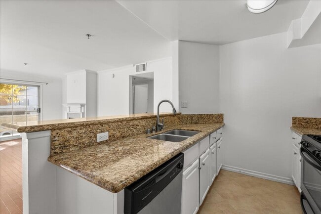 Photo - Bright 3-Bedroom Condo with Balcony and Fireplace in Prime Sherman Oaks Unit 102