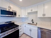 Photo - Renovated Triplex with Private Yard, AC, and Parking