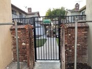 Rear of Gate of Bldg. - 10040 Pomering Rd Unit #E