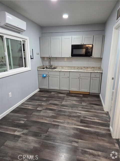 Building Photo - 24363 Delphinium Ave Rental