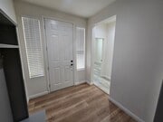 Photo - Open-Concept Living with Downstairs Bedroom & Enclosed Patio Retreat