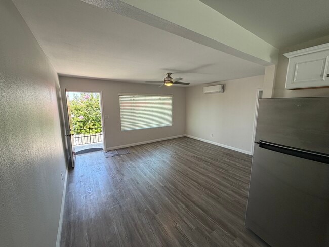 Livingroom view from Kitchen - 15Eleven Apartments