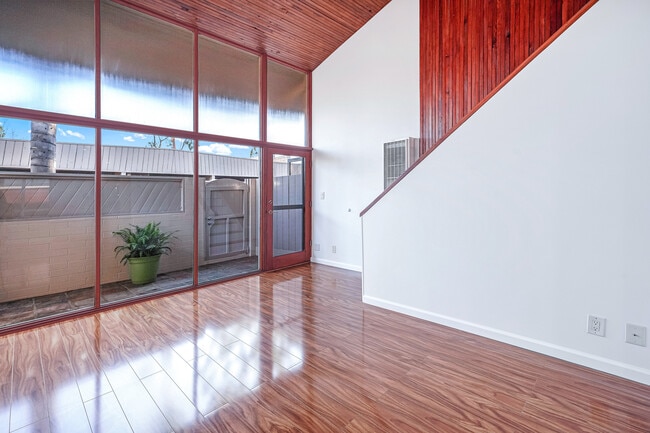 Living Room, Front Patio, & Stairs to Bedroom - 275 S Church Ln Unit 275