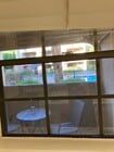 View of pool from kitchen sink - 5300 E Waverly Dr Unit G3