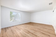 2BR, 1BA - 965SF - Primary Bedroom - Pioneer Plaza