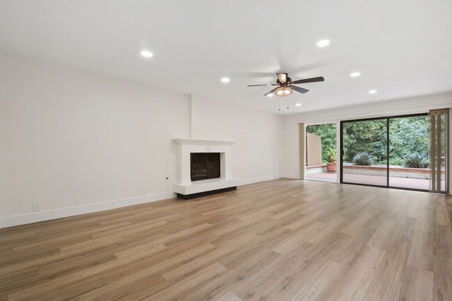 Photo - Beautiful four bedroom, three bath, townhouse available for rent. A must see.