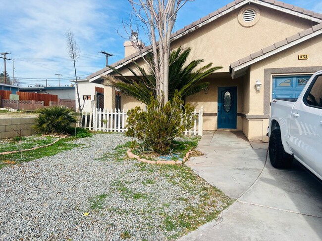 Photo - Spacious Single-Story 4 Bedroom Home with Lovely Backyard