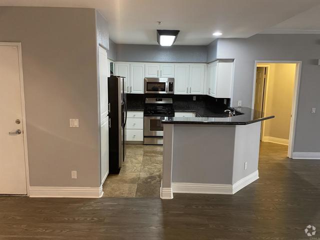 Building Photo - 12372 Carmel Country Rd Unit 202 Rental