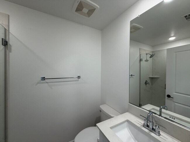 Photo - SD: Modern comforts include owned solar with battery backup, whole-house water filtration, and ea...
