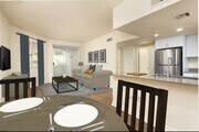 Renovated Package I kitchen, living, and dining areas - eaves Thousand Oaks Apartments