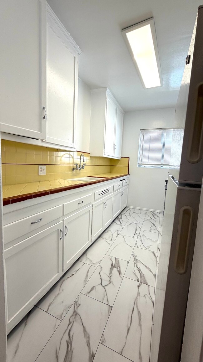 Building Photo - 5937 Gregory Ave Unit 5826-4