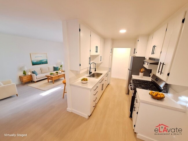 Building Photo - 11756 Runnymede St Unit 218