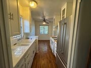 Kitchen View from Laundry - 2816 Waverly Dr Apartment Unit 2816