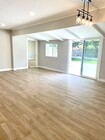 Living room with sliding door to backyard - 10134 Memory Park Ave House