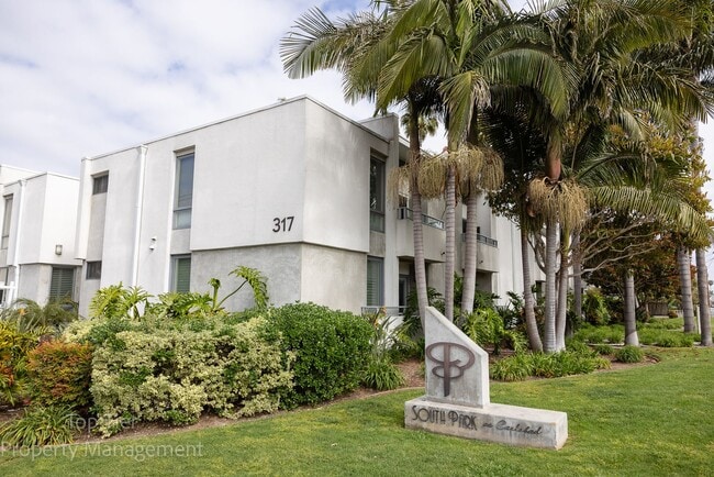 Building Photo - 2-bed, 2-bath 972sqft condo, walking distance to beach in Carlsbad Village, literally one block o... Unit 206