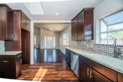 Kitchen open to living room - 2801 Daisy Ave House
