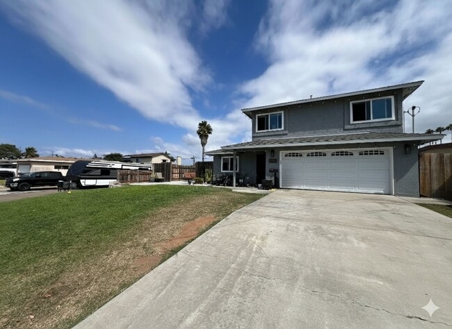 Building Photo - Two story 3 bedroom/2.5 bath home on corne...