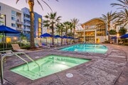 Swim in the pool or jump on in the hot tub - Boardwalk by Windsor Apartments