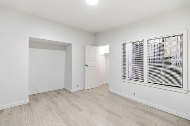 Building Photo - 5251 Main St Unit E