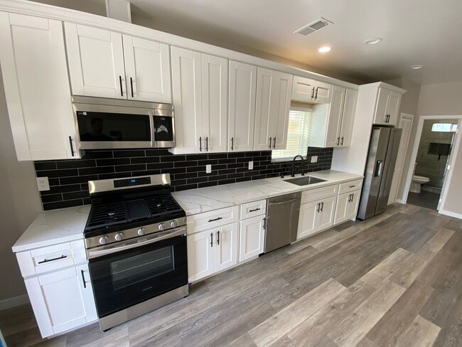 Photo - 4BD/2BA  with Large Upstairs Balcony!