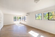 2BR, 1BA - 900SF - Living Room - 5302 Colfax Ave Apartments
