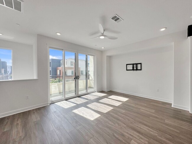 Photo - Luxury 3-Level Townhome for Rent | 2BR + 3BA | 1,500 Sq Ft with 2-Car Garage