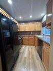 Granite with Sleek BLack appliances - 10911 Bluffside Dr