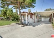 Driveway and car port - 1284 Walnut St Townhome