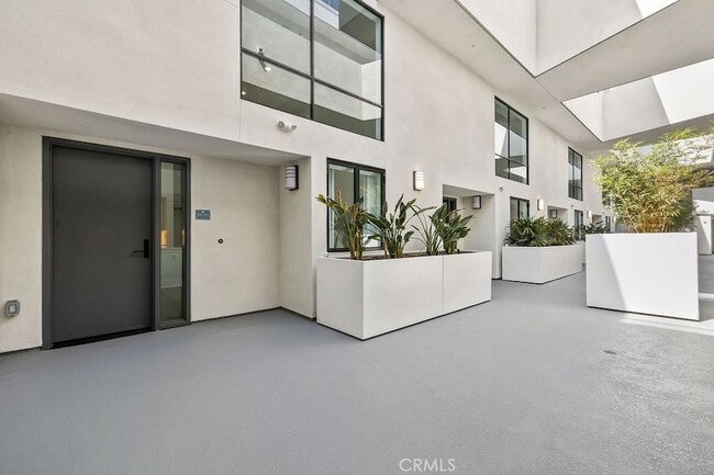 Building Photo - 24722 Del Prado Ave Unit 202
