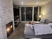 Living room at night - 1745 Camino Palmero St Unit 330