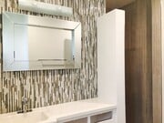 tiled master vanity wall and fixtures - 1214 Rutland Rd Apartment Unit 1