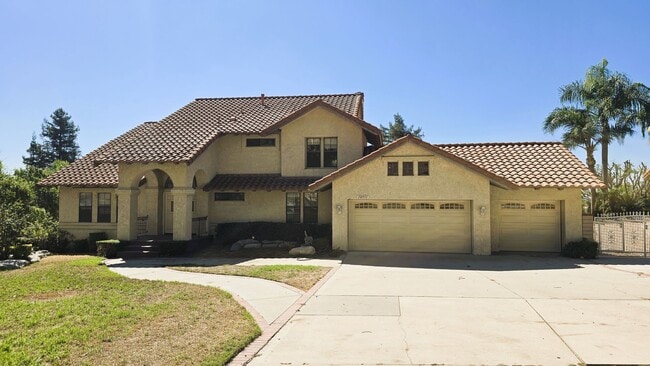 Building Photo - "Spacious, Sunlit Home in a Peaceful Ranch...