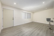 1BR, 1BA - 625SF - Living Room - 142 S Normandie Ave