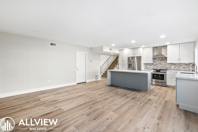 Photo - Welcome to this stunning 5-bedroom, 4-bathroom home located in the desirable Huntington Beach nei...