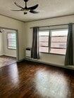 ceiling fan and drapes - 545 S Hobart Blvd Unit 209