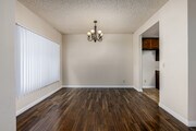 3BR, 2BA - 1400SF - Dining Room - Belmont Plaza Apartment
