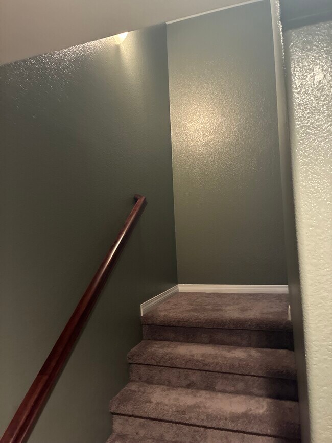 Walking upstairs from the front door - 8894 Spectrum Center Blvd