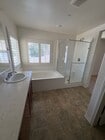 Photo - Spacious 4-Bedroom Home with Large Backyard.