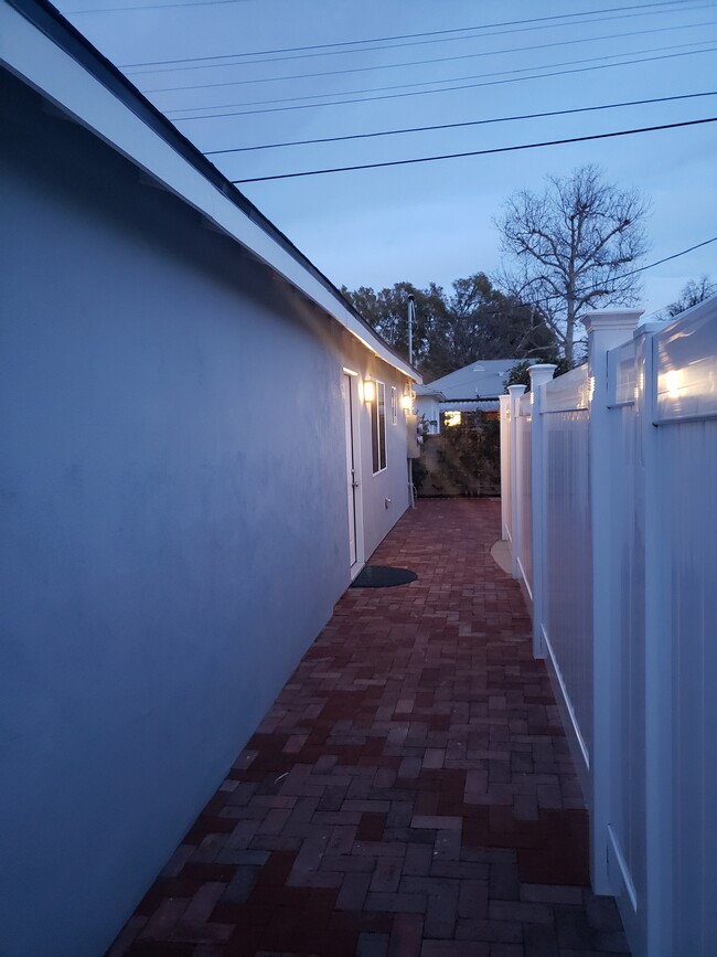 Private entry way with it's own space and courtyard - 7650 Ostrom Ave